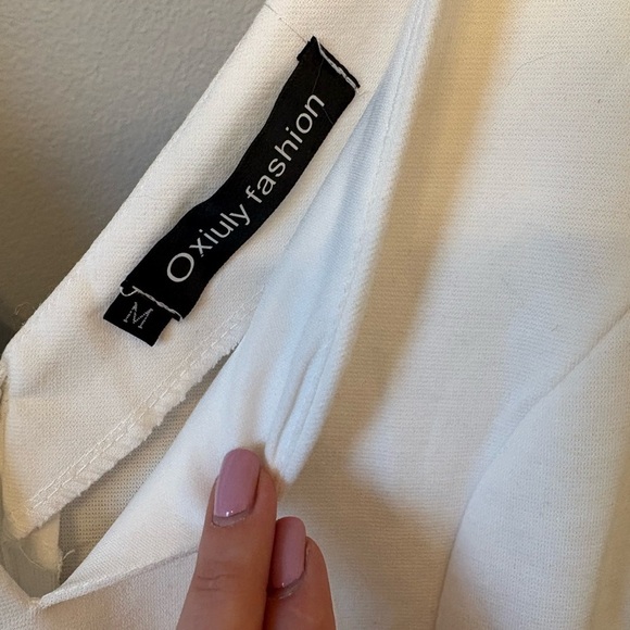 White Asymmetrical Mini Dress with a deep v neckline in size Medium - Picture 5 of 8